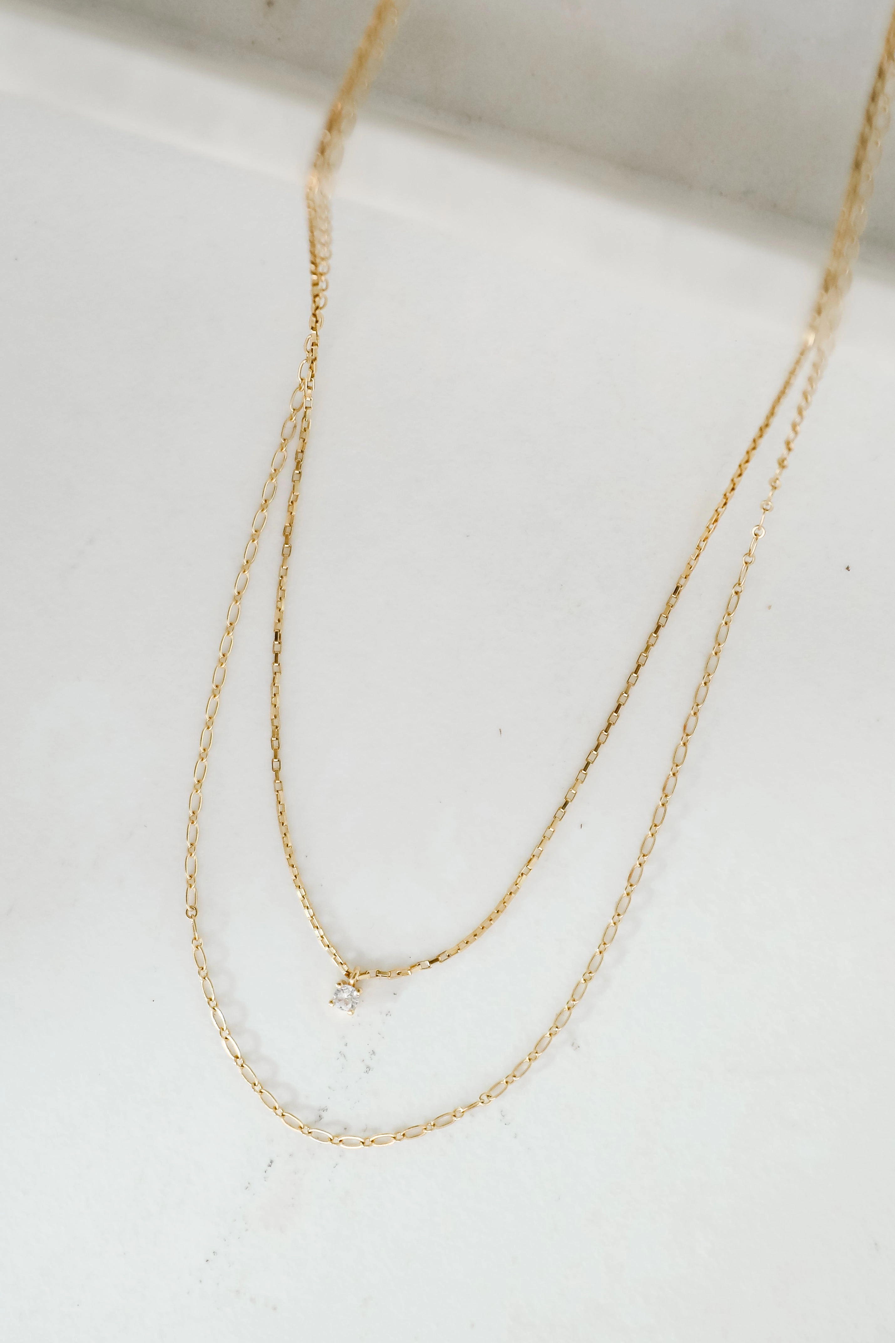 Brielle Gold Layered Rhinestone Charm Necklace